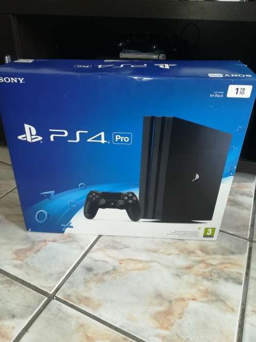PS4 PRO 1TB CONSOLE + 1 CONTROLLER + 2 GAMES (LIKE NEW)
